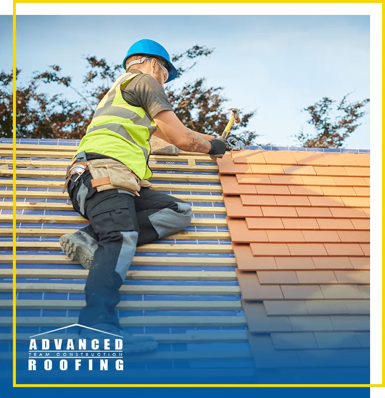 Roofing contractor installing shingles